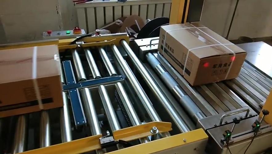 舜天包装客户现场 封箱机、转向机构与打包机高效联动展示